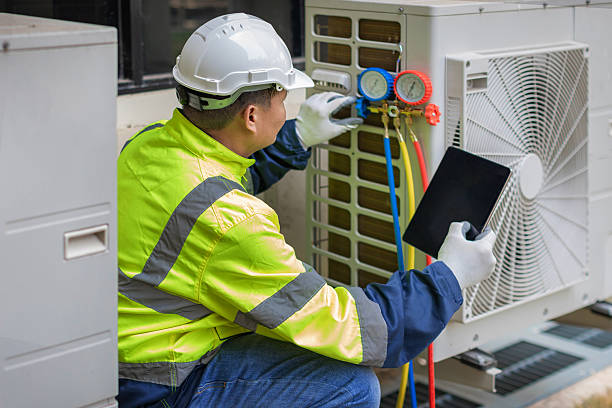 Professional Hvac technician working in Carlsbad, CA